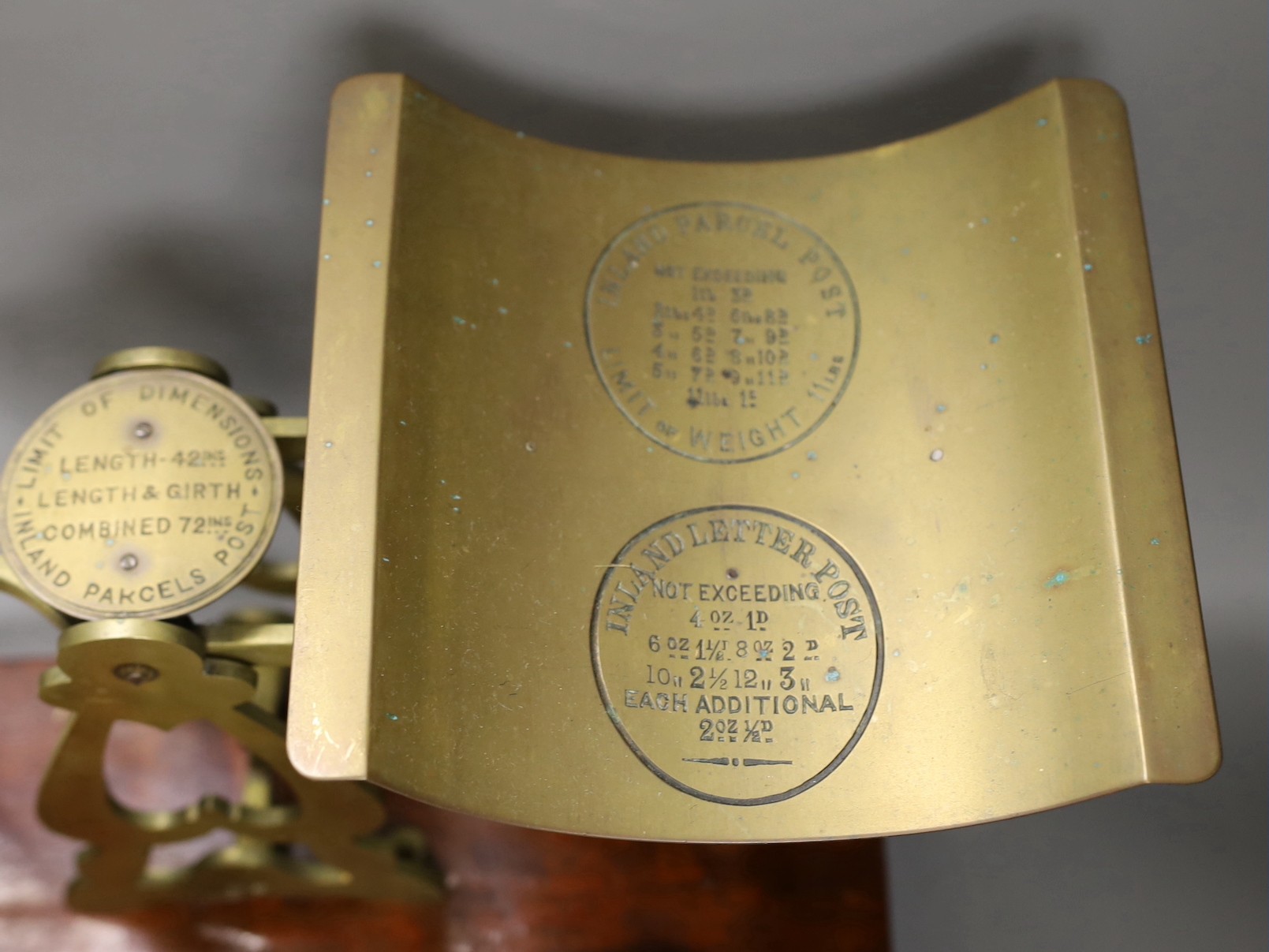 Victorian brass postal scales by S. Mordan & Co. of London, on a mahogany plinth, 45cm wide